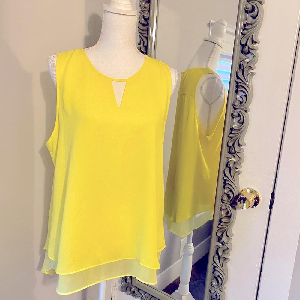 Sleeveless yellow blouse